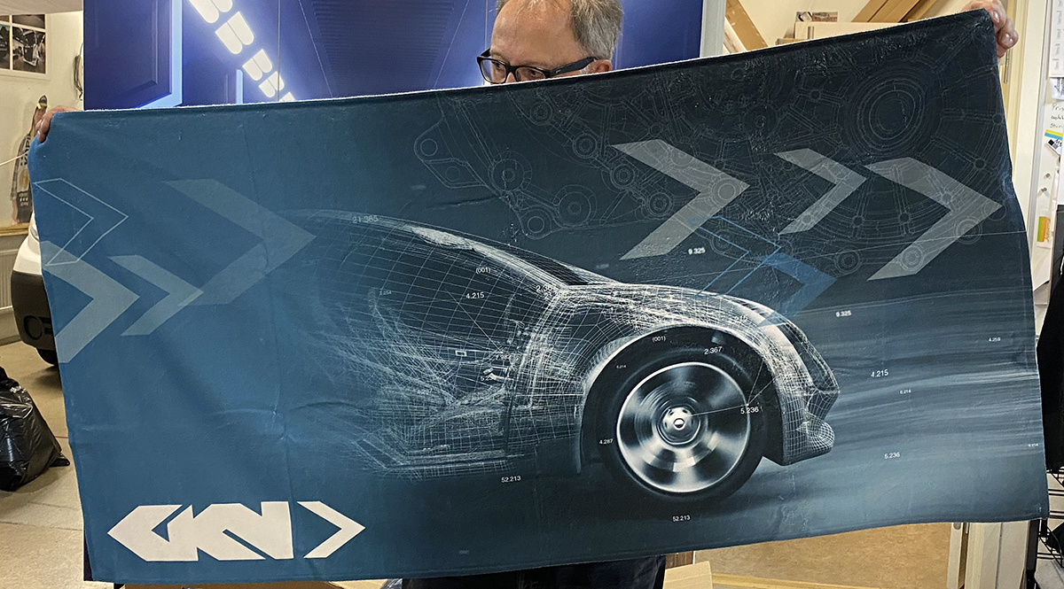 Handduk med tryckt motiv